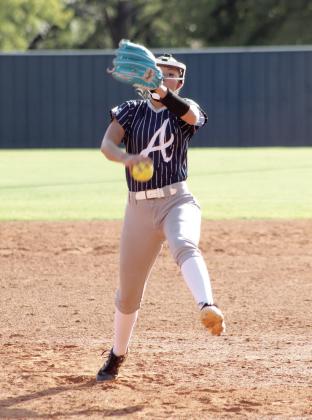 Asher senior Vaeh Pierce launches her pitch in the second inning of the Aug. 20 home game against Carney.
