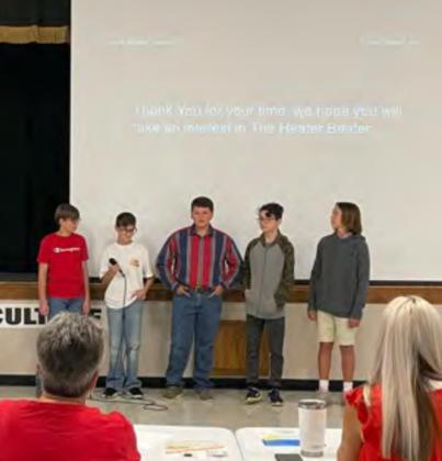 South Rock Creek 7th and 8th grade boys, Jaxon Ledford, 7th; Aiden Sheppard ,7th; Beau Willis, 8th; Brock Malchose, 8th; and Jazon Murray, 8th, present their business plan to the Shark Tank. Photo provided