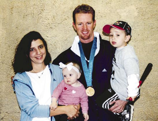 Ryan Franklin was honored, alongside his family, at the Oklahoma Sports Heritage Museum in Guthrie after achieving gold at the 2000 Summer Olympics. Pictured (left to right) Angie Franklin; daughter, Kaylin; Ryan Franklin and son, Logan. Photo provided