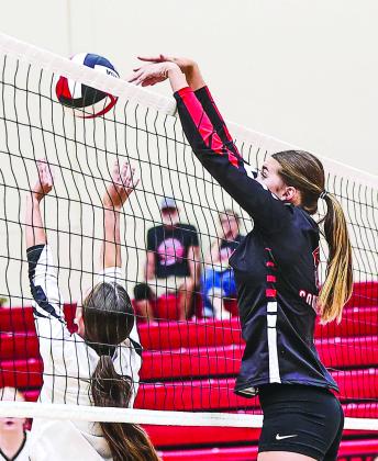Bailey makes a big block for NRC volleyball as they took on Weatherford. The freshmen and JV won their games. The varsity team took them to all five sets, but came up short.
