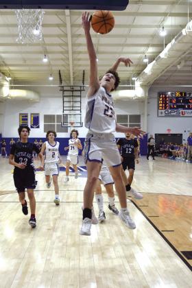 Darius Cheatham tries for two in the first quarter against Little Axe in District play on Feb. 16. Bethel took home the District Championship title. Countywide &amp;amp; Sun/ Julie Talton