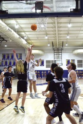 Gavin Lynch tries for two in the first quarter against Little Axe in District play.