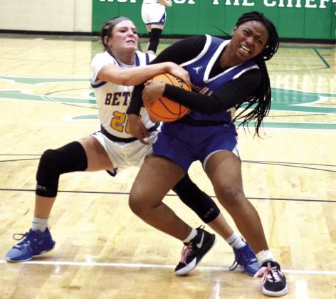 Bethel’s Alexis Williams fights for the ball in the Area matchup with Holdenville. Bethel fought their way to a win and a ticket to the State Tournament where they ended the season with a loss to Washington. Countywide &amp; Sun/Julie Talton