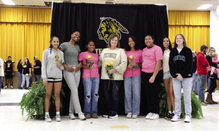 Cross Country Coach Kortney Ozment, center, poses with her cross country girls team during Tecumseh’s Fall Senior Night on Nov. 8. Shown, from left, are Anniah Phillips, JaNya Bruner, Marissa Johnson, Ozment, Aaliyah Stargell, Divyon Stargell, Katelyn Tonubee and Chandler Bryant. Photo provided by Tracey Forrester.
