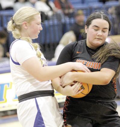 Bethel freshman Lilly Ingmire fights for possession of the ball in the Jan. 30 home game with Wewoka. The Lady Wildcats won, 60-40. Countywide &amp; Sun/Natasha Dunagan