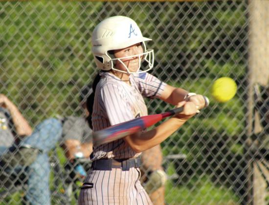 Asher junior Vaeh Pierce sends a single sailing during the fifth inning of the April 9 home game against Tupelo. The Lady Indians won 8-2. Natasha Dunagan, Countywide &amp;amp; Sun