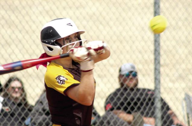 Tecumseh junior Josie Walker lines up for a hit during the April 29 Class 5A Slow Pitch Regional Tournament home game against McLoud.