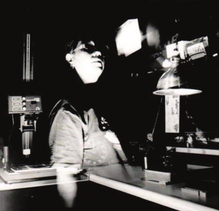 Julie Talton’s mother, Vicki Duff, takes a selfportrait in the newspaper darkroom using a timed exposure. Photo provided.
