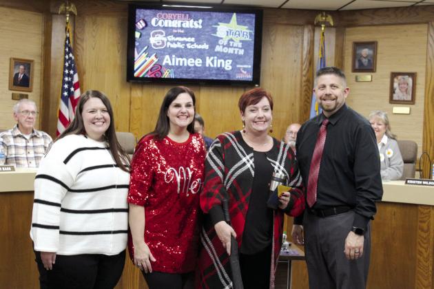 Will Rogers Elementary Instructional Coach Aimee King, third from left, is the Shawnee Star of the Month. Also shown, from left, are Will Rogers Assistant Principal Caity Harrison, Principal Molly Wilson, and Superintendent Dr. Aaron Espolt.