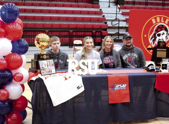 Kinsley Hill poses with her family after signing a letter of intent with Rogers State University in Claremore for softball during Dale Signing Day on Nov. 14. Also shown, from left, are brother, Carson Hill; mom, Cindy Hill; and, dad, Kirk Hill. Countywide &amp; Sun/Natasha Dunagan