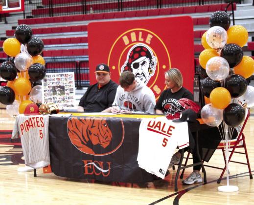 Matthew Sharp signs a letter of intent with East Central University in Ada for baseball during Dale Signing Day on Nov. 14. Also shown are dad, Ryan Sharp, and mom, Wendy Sharp.