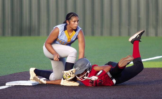 Macomb junior McKenzie Brummett dives to steal third base in the second inning of the Aug. 16 game against New Lima. During the Little River Conference Fast-Pitch Tournament at FireLake Ball Fields, the Lady Hornets beat New Lima, 8-2. On Aug. 17, they won against Earlsboro, 8-3; lost to Moss, 2-12; won with Mason, 13-5, and Strother, 7-6 in overtime; and finally fell in a second game with Moss, 0-10. They took runner-up in the tournament.