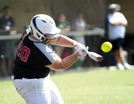 Earlsboro freshman Abbigail McAlister hits a single during the fourth inning of the Aug. 17 Varnum game.