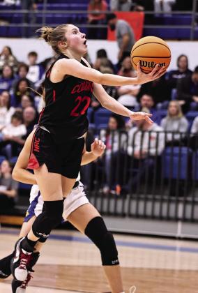 North Rock Creek’s Kadence Munn puts up a layup for the bucket.