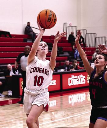North Rock Creek’s Peyton Lilley goes up for two in action Tuesday, Jan. 14 against OCS.