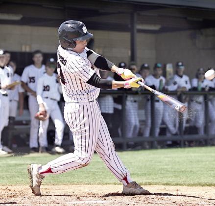 North Rock Creek's Kona Paningsoro connects for a single. Photo courtesy of Gowin Photography