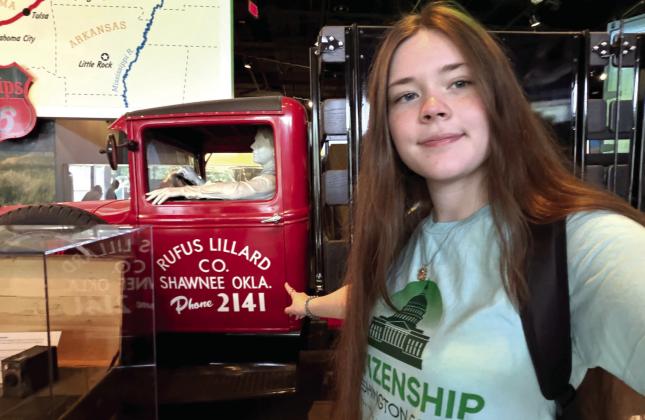 North Rock Creek senior Victoria Nelms points to a panel truck from Shawnee, OK, on display at the National Museum of American History in Washington, DC, during the 4-H Citizenship Washington Focus leadership program, July 5-11. Photos provided.