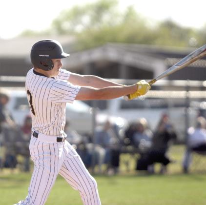 Tecumseh junior Elias Hasler hits a double in the second inning of the home game with Asher on April 7. Natasha Dunagan, Countywide &amp; Sun