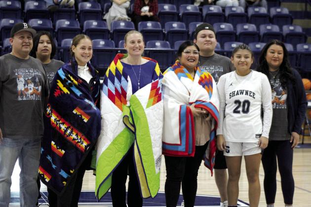 Shawnee senior Tylyn Thurman and her family presented Head Girls Basketball Coach Wendi Wells and the assitant coaches with blankets during Senior Night ceremonies on Feb. 9. Shown are Marty Thurman, Tyler Thurman, Shaiann Tramble, Wells, Leila Kaseca, Tye Thurman, Tylyn Thurman, and Sophia Thurman. Countywide &amp;amp; Sun/Natasha Dunagan