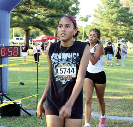 Shawnee High School junior Tatyanna Thierry finishes her race in 21st place out of 49 high school girls. Natasha Dunagan, Countywide &amp; Sun