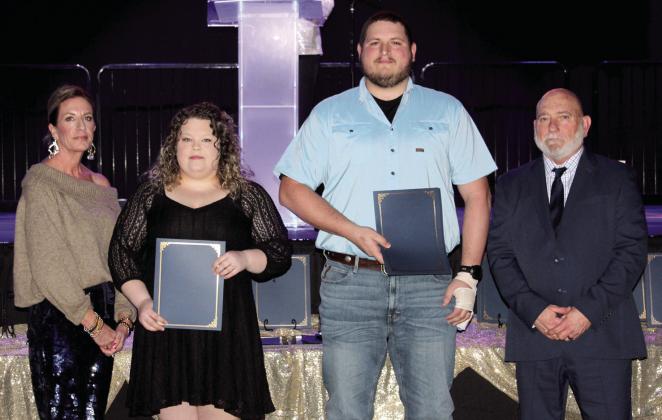 Dispatcher Haley Wright and Officer Brian McKinney receive Life-Saving Awards during the 20th Annual “Celebration of Heroes” Shawnee Police Foundation Awards Banquet at the Grand Casino Hotel and Resort on Jan. 31. Wright talked a caller through CPR, and McKinney took over chest compressions until an ambulance arrived, saving a life. Also shown are SPF Chair Melissa Stuteville, far left, and Deputy Chief John Goss, far right.