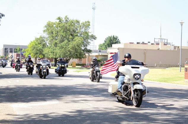 Participants in the Sixth Justin Terney Memorial Poker Run drive north on Broadway Ave., on July 23, leaving from the Pottawatomie County Courthouse. About 78 motorcyclists and three vehicle drivers participated in the event. Countywide &amp; Sun/Natasha Dunagan