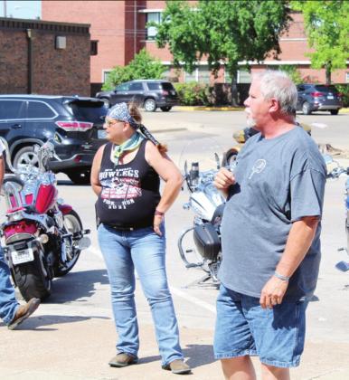 Pottawatomie County Sheriff's Deputy Jesse McCord speaks to those participating in the Sixth Justin Terney Memorial Poker Run, informing them of the route on July 23. McCord began the event in 2017 after his friend and co-worker was killed in the line of duty. Countywide &amp; Sun/Natasha Dunagan