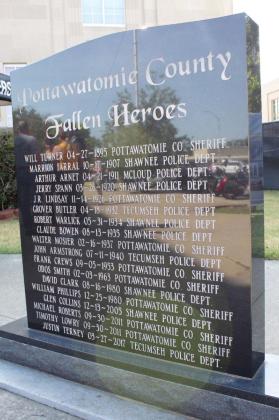 The "Pottawatomie County Fallen Heroes" memorial stood nearby as participants in the Sixth Justin Terney Memorial Poker Run registered for the event in front of the Pottawatomie County Courthouse on July 23. Terney's name is the last one listed on the monument, and event organizer Jesse McCord said there are plans to fundraise for a smaller second monument for additional names. Countywide &amp; Sun/Natasha Dunagan
