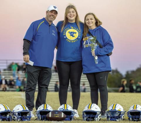 Student Trainer Ashlee Ginn and others were honored during Bethel’s Senior Night ceremonies at the home football game on Nov. 3. Ginn is shown with her father Bethel Football Coach Joey Ginn and her mother Kimberly Ginn.