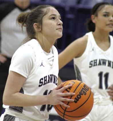Shawnee sophomore Aniyah Cuellar concentrates before making a free throw during the Senior Night home game.