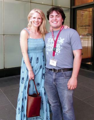 Cooper Lincoln, winner of the Kelli O'Hara Award for Lead Actor in a High School Musical, poses with the award's namesake, while in NYC. Photo Provided