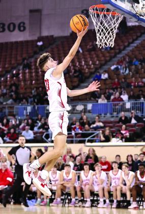 NRCs Jordan Coody soars to the rim for two in State Quarter-Final action Mar. 8. Photo courtesy of Gowin Photography
