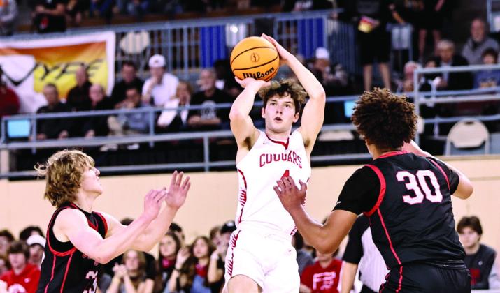 NRCs Jace McRay sends a shot over opponents Mar. 8 at the State Fairgrounds Arena. Photo courtesy of Gowin Photography