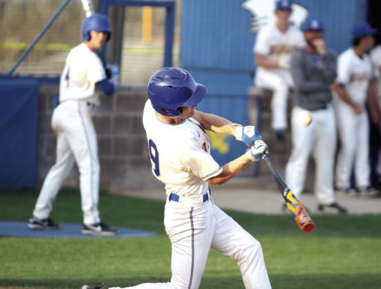 Bethel junior Kadenn May takes his turn at bat.