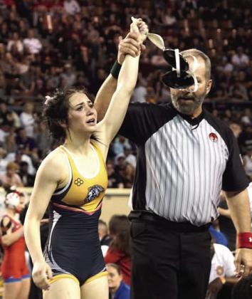 Tecumseh senior Vivian Hayes is declared the winner of her match in the 105 weight division of the OSSAA Class 5A Girls Wrestling State Championship on March 1 at the State Fair Arena. Hayes is the first girls wrestling state champion at Tecumseh High School. Photo provided