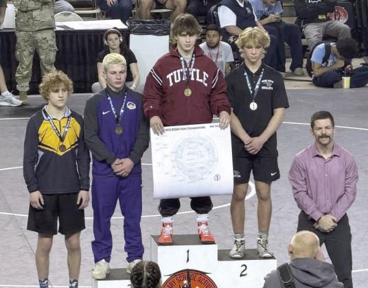 Tecumseh's Nick White, far left, placed fourth in his weight class of the OSSAA Class 4A Boys Wrestling State Championship on March 1 at the State Fair Arena. According to the Tecumseh Savage Wrestling Facebook page, White is now a two-time state placer. Photo provided
