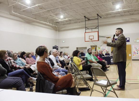 Shawnee Superintendent Dr. Aaron Espolt speaks to a crowd of more than 100 people during a Shawnee Board of Education Special Meeting held at Jefferson Elementary on Jan. 29. Countywide &amp; Sun/Natasha Dunagan