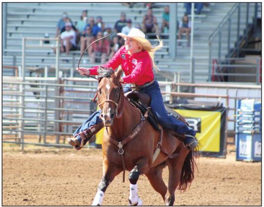 Matraya Haynes, of Maud, finishes up her run in Barrel Racing on the morning of July 15 during the IFYR at the Heart of Oklahoma Expo Center. Countywide &amp; Sun/Natasha Dunagan