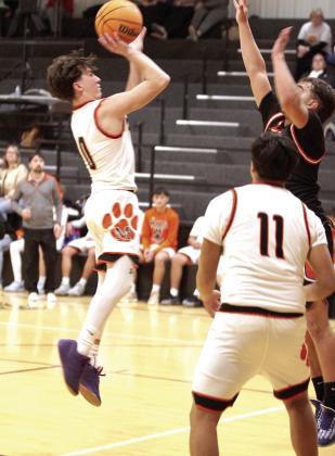 Maud sophomore Micah Brooks sinks a jumper during the third quarter of the Jan. 16 home game with Dewar.