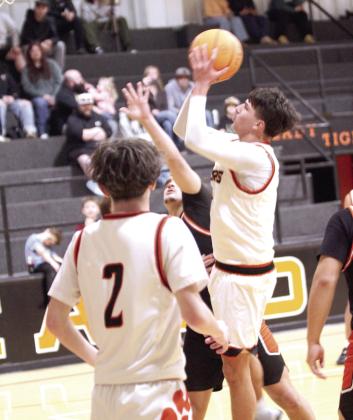 Maud sophomore Trent Marshall aims and scores during the fourth quarter of the Jan. 16 home game with Dewar.
