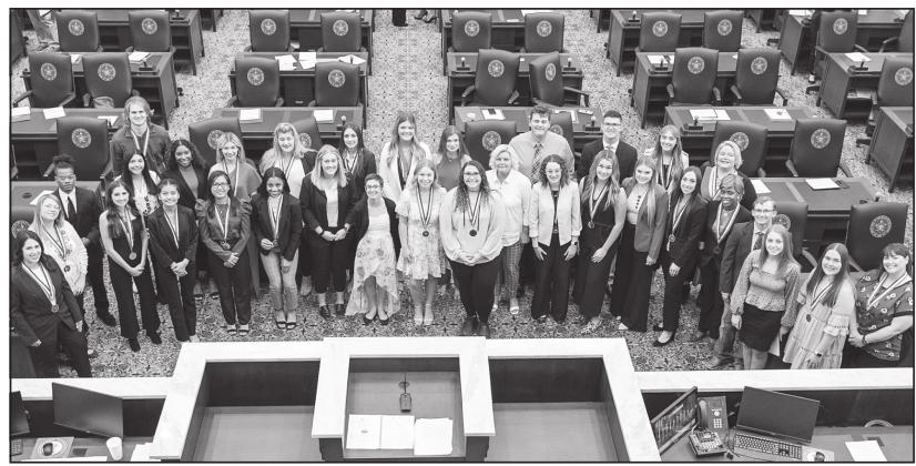 All-Oklahoma Academic Team honorees and Tuition Waiver recipients pose for a photo following the awards assembly on the chamber floor of the Oklahoma House of Representatives. Provided photo.
