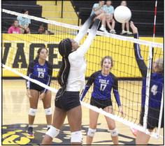 Tecumseh’s JaNya Bruner defends the net with a block during the Sept. 5 game against Noble. Countywide &amp;amp; Sun/Natasha Dunagan