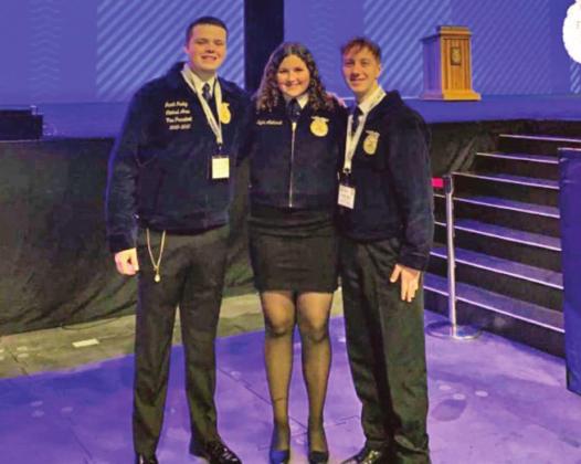 Tecumseh FFA members Jacob Nunley, Kylee Akehurst, and Caleb Blair pose during the National FFA Convention and Expo in Oct. They were three of nine members in Pottawatomie County who received their American FFA Degrees this year. Emily Loman, also of Tecumseh, is not shown. Photo provided.