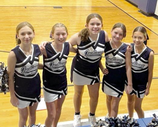 The Asher Junior High cheerleaders, pictured from left, are Josie Dobbs, seventh grade; Skylar Magby, seventh grade; Arlee Cloud, fifth grade; Grace Holmes, fifth grade; and Elsa Tubbesing, seventh grade. Photo provided