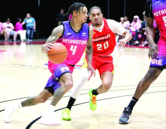 The Potawatomi Fire’s Chuck Guy drives to the basket during the Pink Out for Cancer and “Shawnee Strong” for disaster relief game with the Shreveport Mavericks on April 21. Guy led the Fire with 29 points, 13 rebounds, and six assists in the game, which was won by the Fire, 122-103, according to their Facebook page. Countywide &amp;amp; Sun/Natasha Dunagan