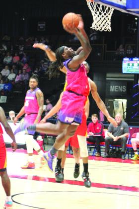 Potawatomi Fire’s K.D. Moore takes his shot during the Pink Out for Cancer and “Shawnee Strong” for disaster relief game with the Shreveport Mavericks on April 21.