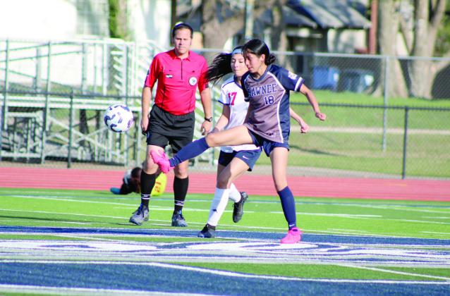 Shawnee freshman Winter Peacore kicks the ball downfield during the Apr. 8 home game with Nathan Hale. The Lady Wolves won, 10-0. Natasha Dunagan, Countywide &amp; Sun