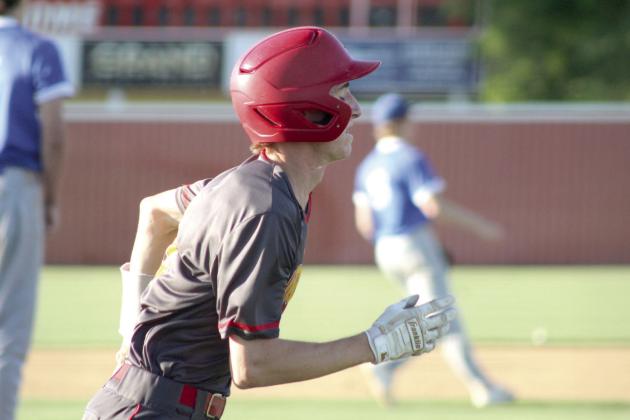 Dale sophomore Chase Harris runs to first base after hitting a single in home game against Guthrie. Natasha Dunagan, Countywide &amp;amp; Sun