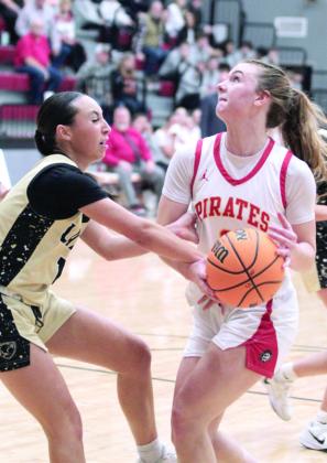 Dale’s Skylar Anderson focuses on the hoop, but is fouled during the Dec. 3 home game against Latta. Countywide &amp; Sun/Natasha Dunagan