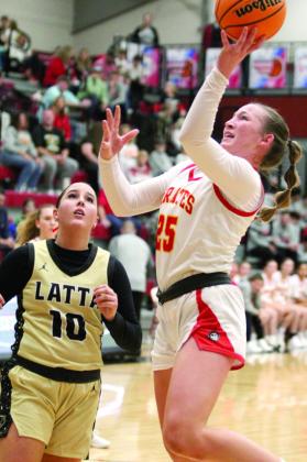 Dale’s Teague Muncy puts up a shot during the Dec. 3 home game against Latta. The Lady Pirates won, 60-58, and later, the Pirates stomped the Panthers, 79-34. Countywide &amp; Sun/Natasha Dunagan